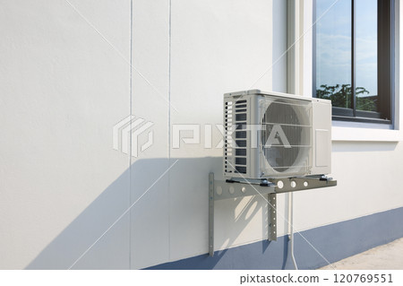 Condenser unit outside home. 120769551