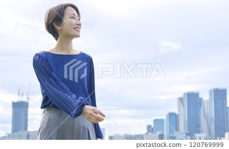 Woman walking outside 120769999