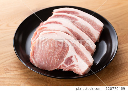 Thickly sliced pork loin for tonkatsu 120770469