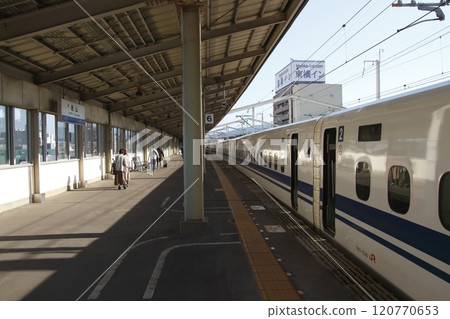 Sanyo Shinkansen N700 series Nozomi train stopped at Tokuyama Station 120770653