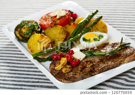 Photography of plate with baked veal with vegetables Photography of plate with baked veal with vegetables 120770859