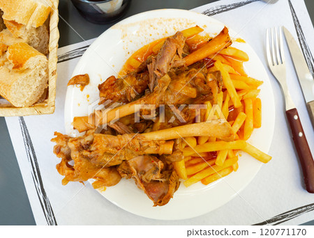 Baked in oven lamb meat with gravy 120771170