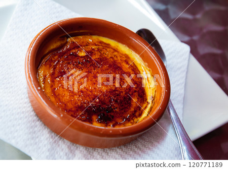 Catalan cream delicious dessert with sugar toast. Typical in Catalonia Spain Catalan cream delicious dessert with sugar toast. Typical in Catalonia Spain 120771189