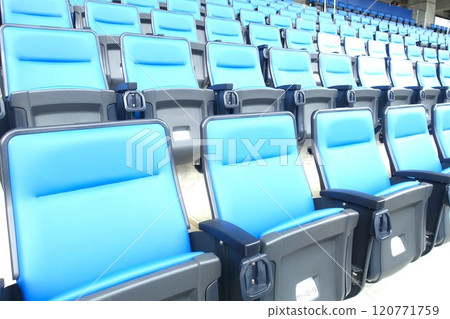 Seats lined up in the stadium Seats lined up in the stadium 120771759