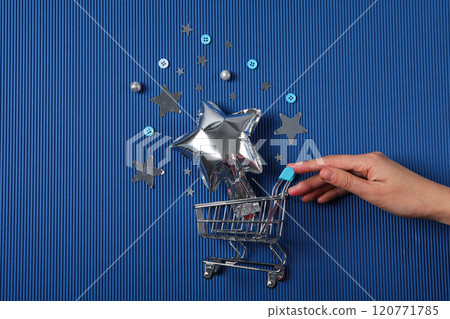 Party decor and confetti concept, with shopping cart. Party decor and confetti concept, with shopping cart. 120771785