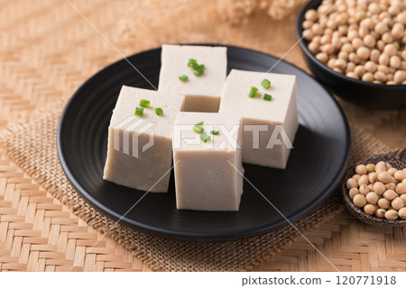 Fresh tofu with soy bean seeds, Vegan food ingredient in Asian cuisine, Plant based diet Fresh tofu with soy bean seeds, Vegan food ingredient in Asian cuisine, Plant based diet 120771918