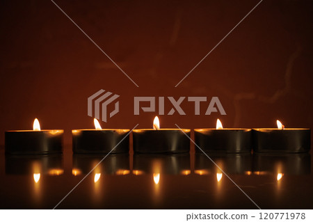 Many burning candles.Candles new year 120771978