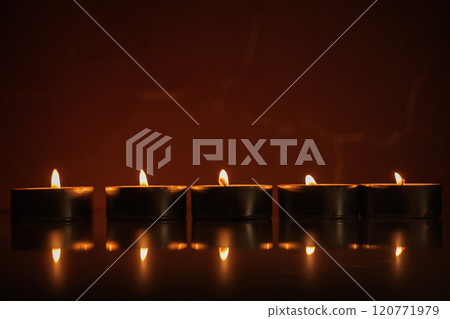 Many burning candles.Candles new year 120771979