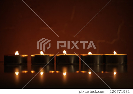 Many burning candles.Candles new year 120771981