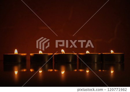 Many burning candles.Candles new year 120771982