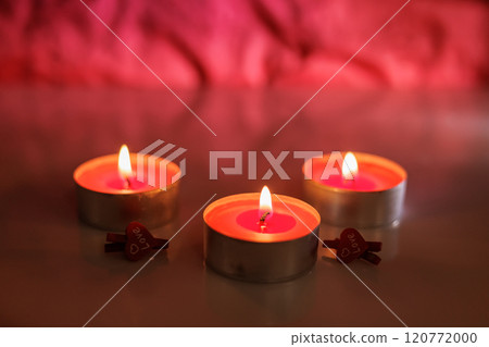 Burning Romantic Candlelight On red Background. 120772000