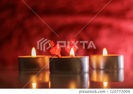 Romantic night with candlelight and bokeh background.New year or romantic valentine Day 120772009
