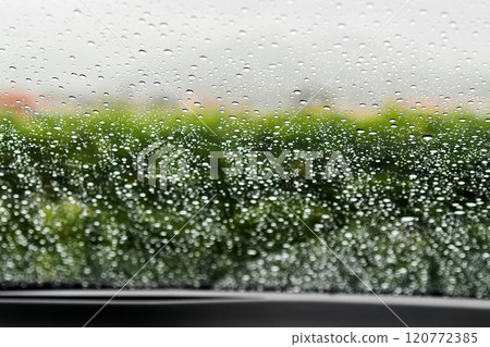 Water droplets on the windshield 120772385
