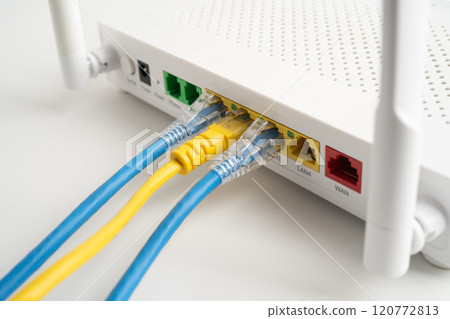 Ethernet cable with wireless router connect to internet service provider internet network. 120772813