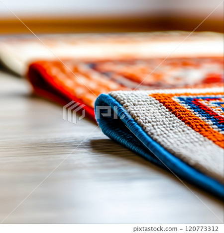 Close-Up of Colorful Textile with Intricate Patterns and Texture 120773312