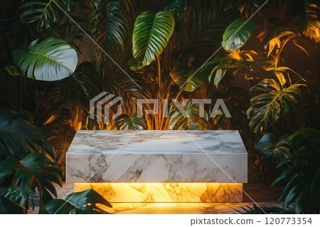 Marble podium surrounded by lush tropical foliage, illuminated by warm natural light 120773354