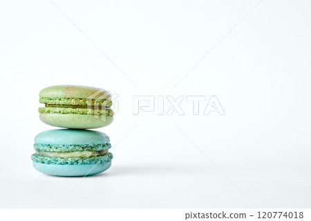 Stack of two colorful French Macarons, macaroons cakes with different flavors Stack of two colorful French Macarons, macaroons cakes with different flavors 120774018
