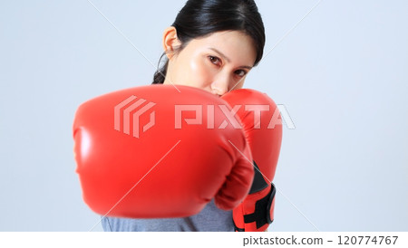Image of a female boxer 120774767