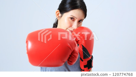 Image of a female boxer 120774768