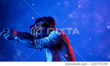 Gamer access metaverse by using VR glasses and playing shooting game. Apparatus. Gamer access metaverse by using VR glasses and playing shooting game. Apparatus. 120775239