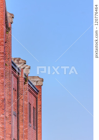 Landscape with red brick warehouse and blue sky 120776464