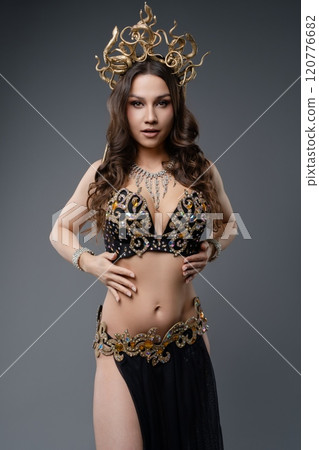 Elegant dancer in ornate costume showcasing traditional art and culture 120776682