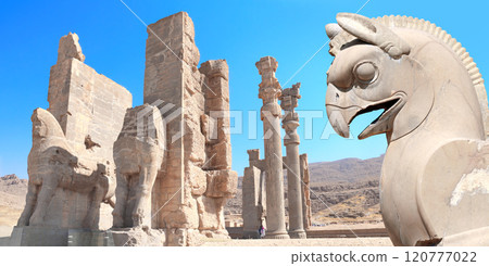 Stone sculpture of griffin and Gate of All Nations (Xerxes Gate) with stone statues of lamassu in ancient city Persepolis, Iran Stone sculpture of griffin and Gate of All Nations (Xerxes Gate) with stone statues of lamassu in ancient city Persepolis, Iran 120777022