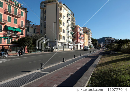 Sestri Levante, Italy - November 14, 2024. Traditional buildings and street on sunny day. Tourism and recreation. Ecologically clean nature.  120777044