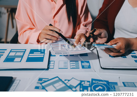 Young Asian business creative team work together, mobile application software design project. Brainstorm meeting, internet technology, smartphone web app designer, office coworker teamwork concept 120777231