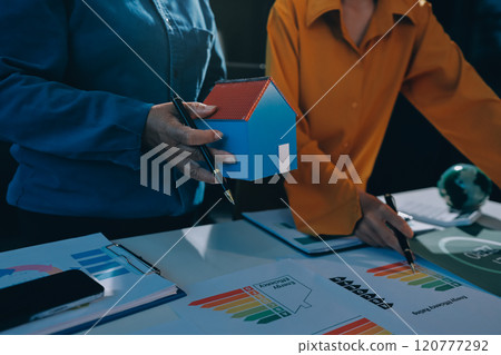 ESG environmental social governance display on laptop on eco-friendly company meeting with business people implementing environmental protection for clean and sustainable future ecology. Trailblazing ESG environmental social governance display on laptop on eco-friendly company meeting with business people implementing environmental protection for clean and sustainable future ecology. Trailblazing 120777292