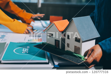 ESG environmental social governance display on laptop on eco-friendly company meeting with business people implementing environmental protection for clean and sustainable future ecology. Trailblazing ESG environmental social governance display on laptop on eco-friendly company meeting with business people implementing environmental protection for clean and sustainable future ecology. Trailblazing 120777316