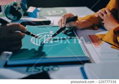 ESG environmental social governance display on laptop on eco-friendly company meeting with business people implementing environmental protection for clean and sustainable future ecology. Trailblazing 120777338