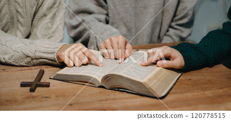 Christians are congregants join hands to pray and seek the blessings of God. 120778515