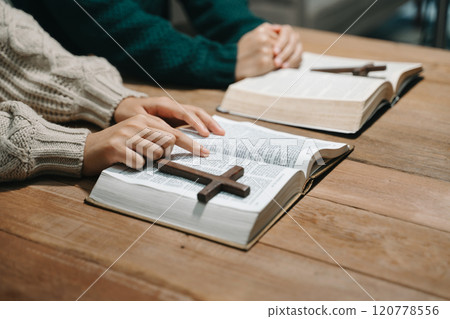 Christians are congregants join hands to pray and seek the blessings of God. 120778556