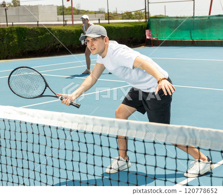 Tennis serve match on hard court 120778652