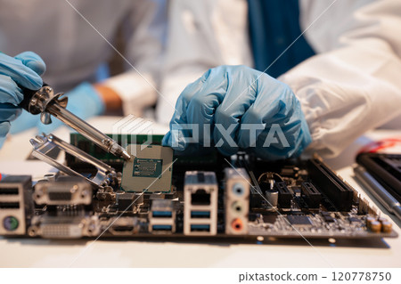 killed hands repairing electronic devices with precision. technology repair, technician expertise, and modern electronic maintenance. killed hands repairing electronic devices with precision. technology repair, technician expertise, and modern electronic maintenance. 120778750