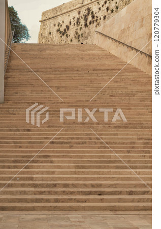 Grand Stone Staircase Leading to Historic Fortifications 120779304