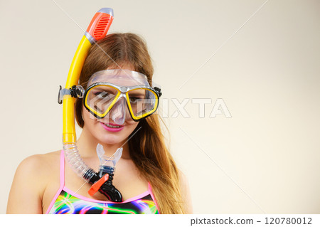 Woman with snorkeling mask having fun Woman with snorkeling mask having fun 120780012