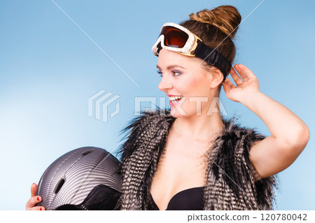 Woman wearing sexy winter sport outfit 120780042