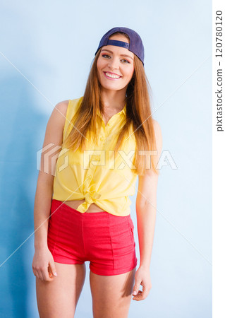 Pretty teenage girl in fashionable clothes. 120780120
