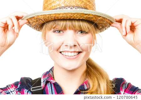 Portait smiling woman wearing sun hat and shirt Portait smiling woman wearing sun hat and shirt 120780645
