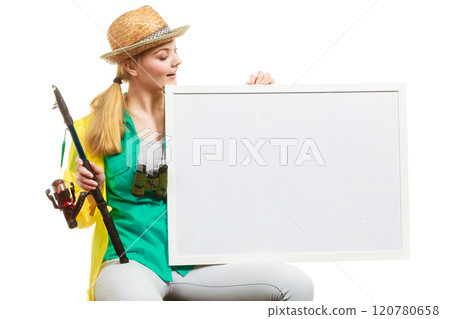 Happy woman with fishing rod holding board 120780658