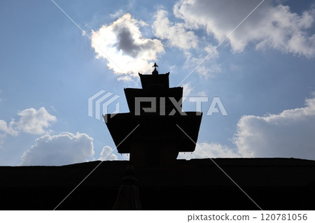 Landscape with white clouds and blue sky and black silhouette temple buildings in Kathmandu, Nepal 120781056
