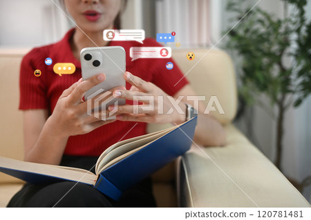 Woman checking her smartphone surrounded by floating message and social media notifications bubbles Woman checking her smartphone surrounded by floating message and social media notifications bubbles 120781481