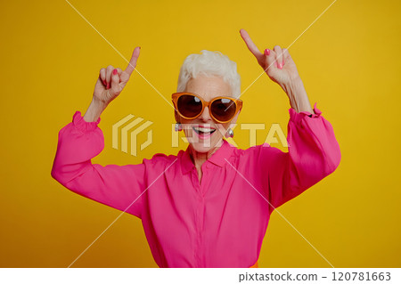 Colorful senior woman portrait with joyful smile Colorful senior woman portrait with joyful smile 120781663