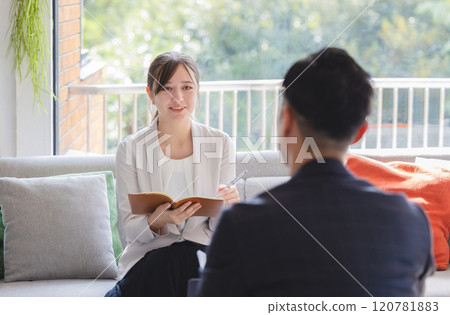 Businesswoman doing an interview Businesswoman doing an interview 120781883