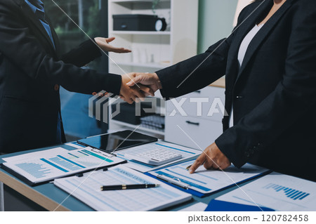 Business handshake for teamwork of business merger and acquisition,successful negotiate,hand shake,two businessman shake hand with partner to celebration partnership and business deal concept 120782458