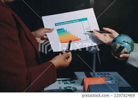 Carbon offset price report CO2 emission. Future growth Net zero waste in ESG ethical SME office protect climate change global warming social issues project. Group of asia people Eco friendly SDGs plan Carbon offset price report CO2 emission. Future growth Net zero waste in ESG ethical SME office protect climate change global warming social issues project. Group of asia people Eco friendly SDGs plan 120782469
