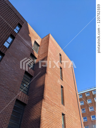 Top Floors of a Highrise Council Block of Flats with Blue Sky 120782889