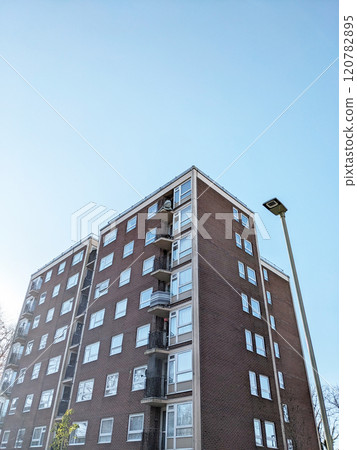 Top Floors of a Highrise Council Block of Flats with Blue Sky 120782895